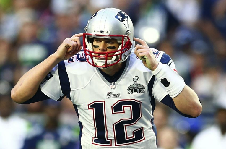 Brady pointing at head.png